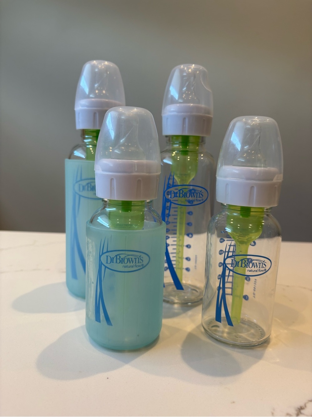 Dr Browns Glass Baby Bottle Set of 4 Clear and 2 Light Blue Silicone Sleeves